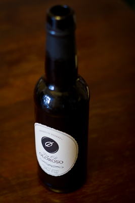 The bottle of the Dry Old Oloroso: dark brown, somewhat squat, unpretentious — for all the world like a bottle of beer