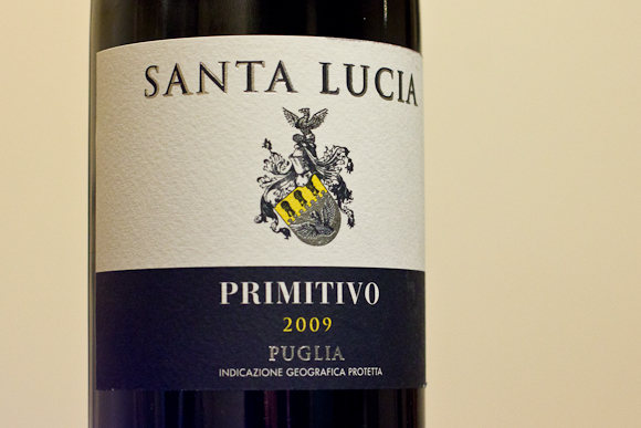 The Wine Society's Santa Lucia Primitivo from Puglia. Black, yellow and cream label with a crest