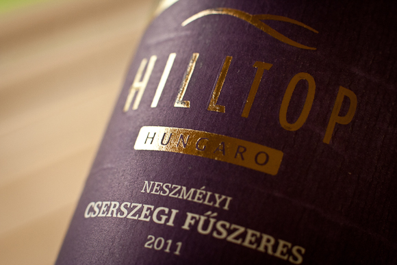 Closeup of the purple label of this Hungarian wine. Simple typographic design.