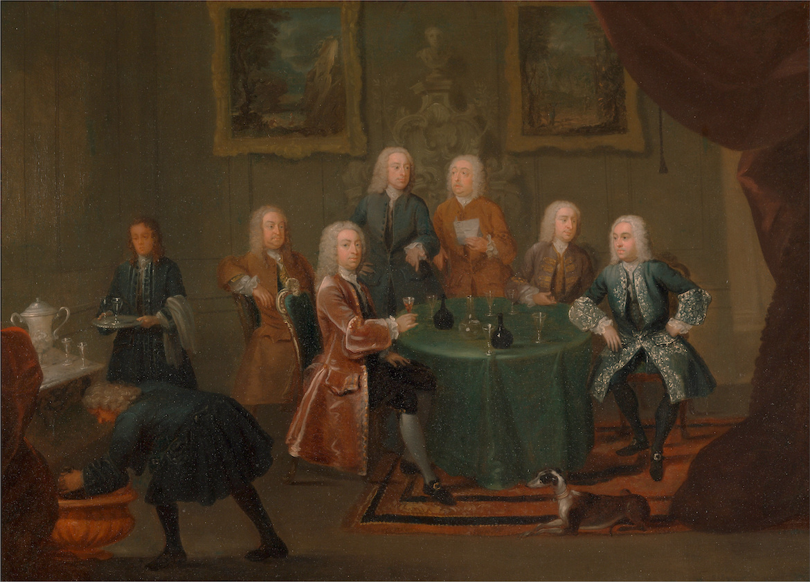 Painting of aristocratic gentlemen in a drawing room taking their wine. A servant skulks to the left...