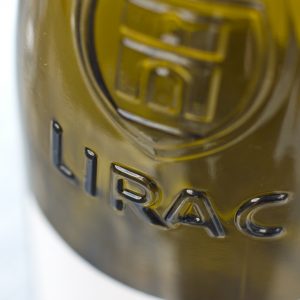 Closeup of Lirac motif on wine bottle