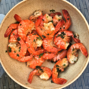A bowl of garlic prawns