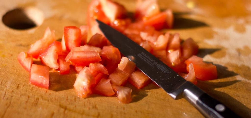 Chopped tomato with a Sabatier knife